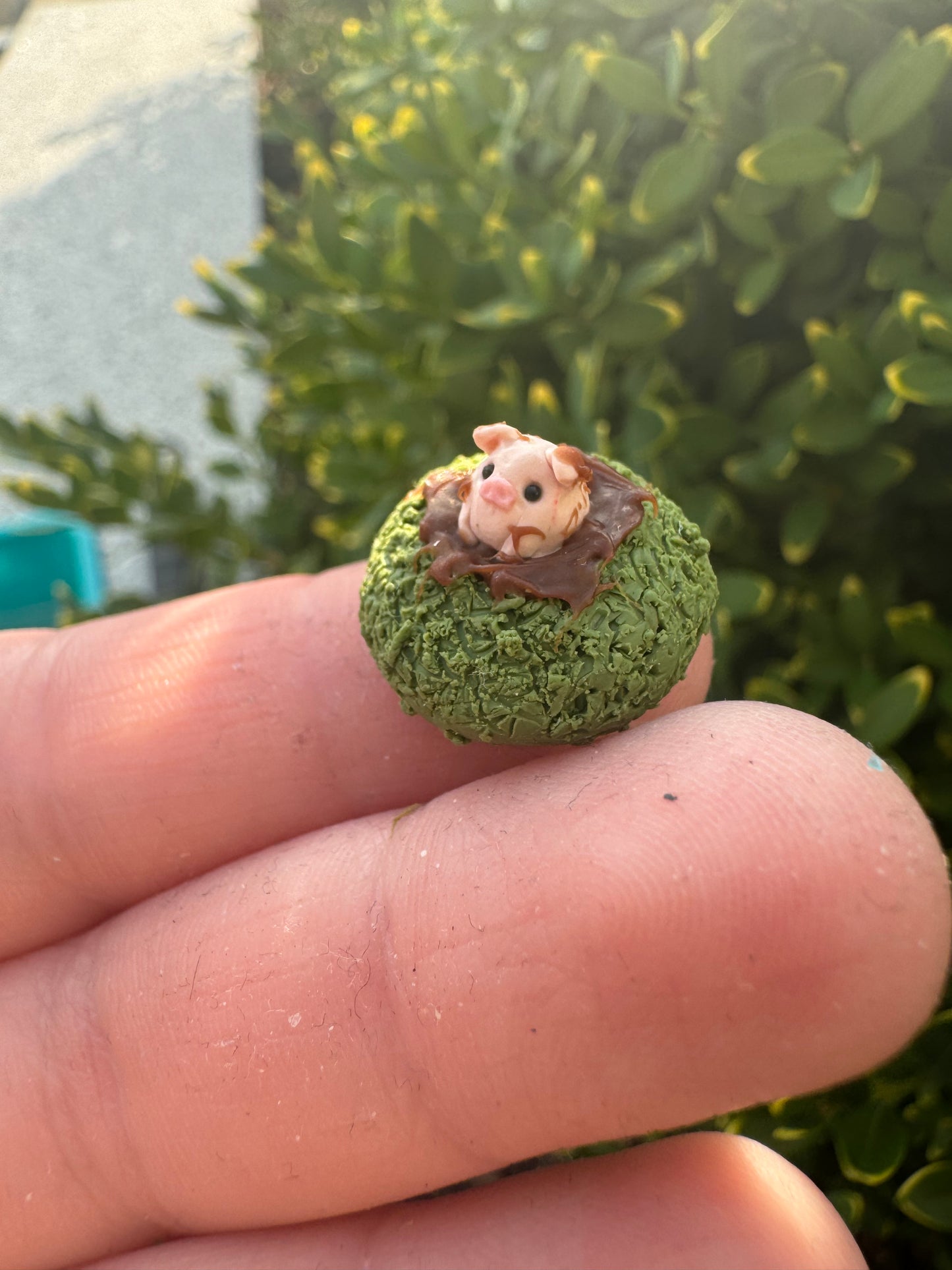 Micro Pig In Mud Figurine